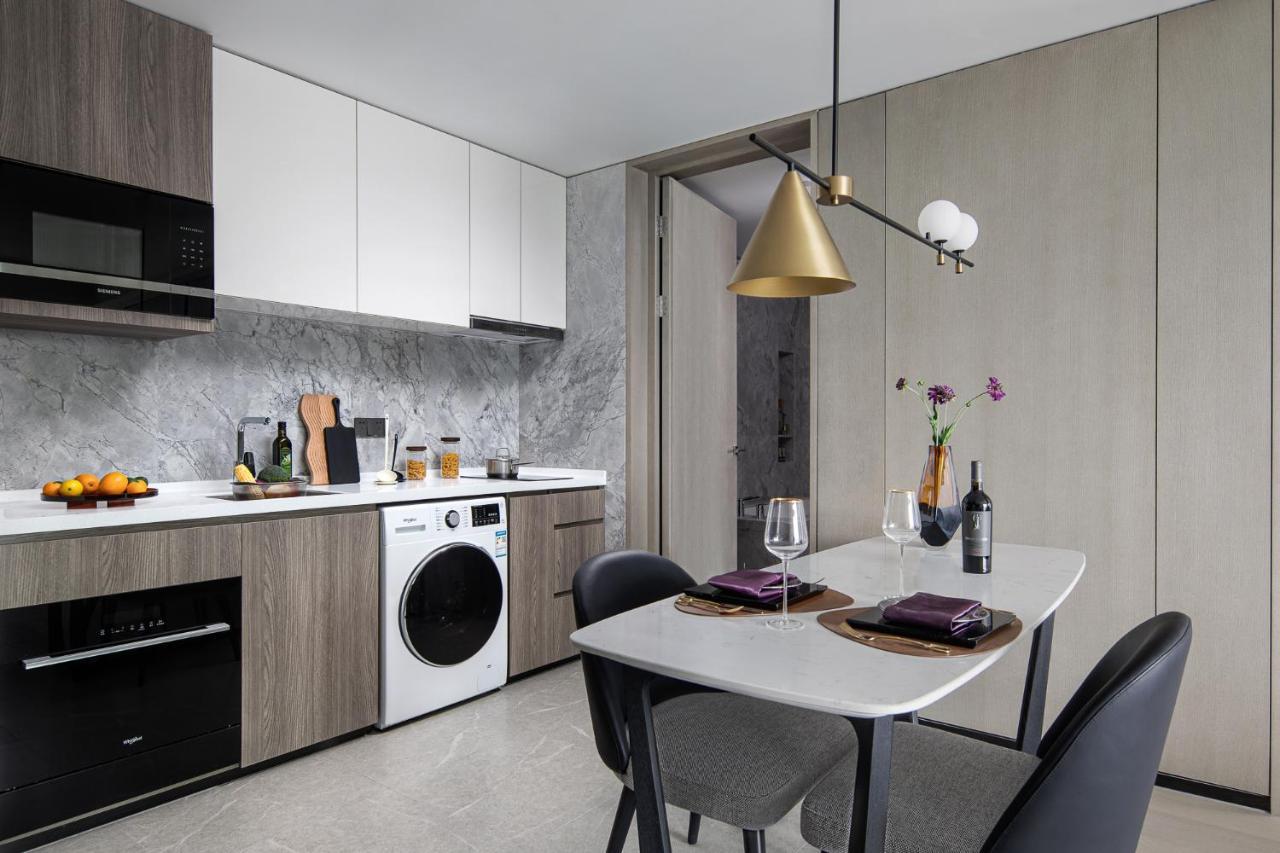 Apartamento Ascott Icc Cantón Exterior foto