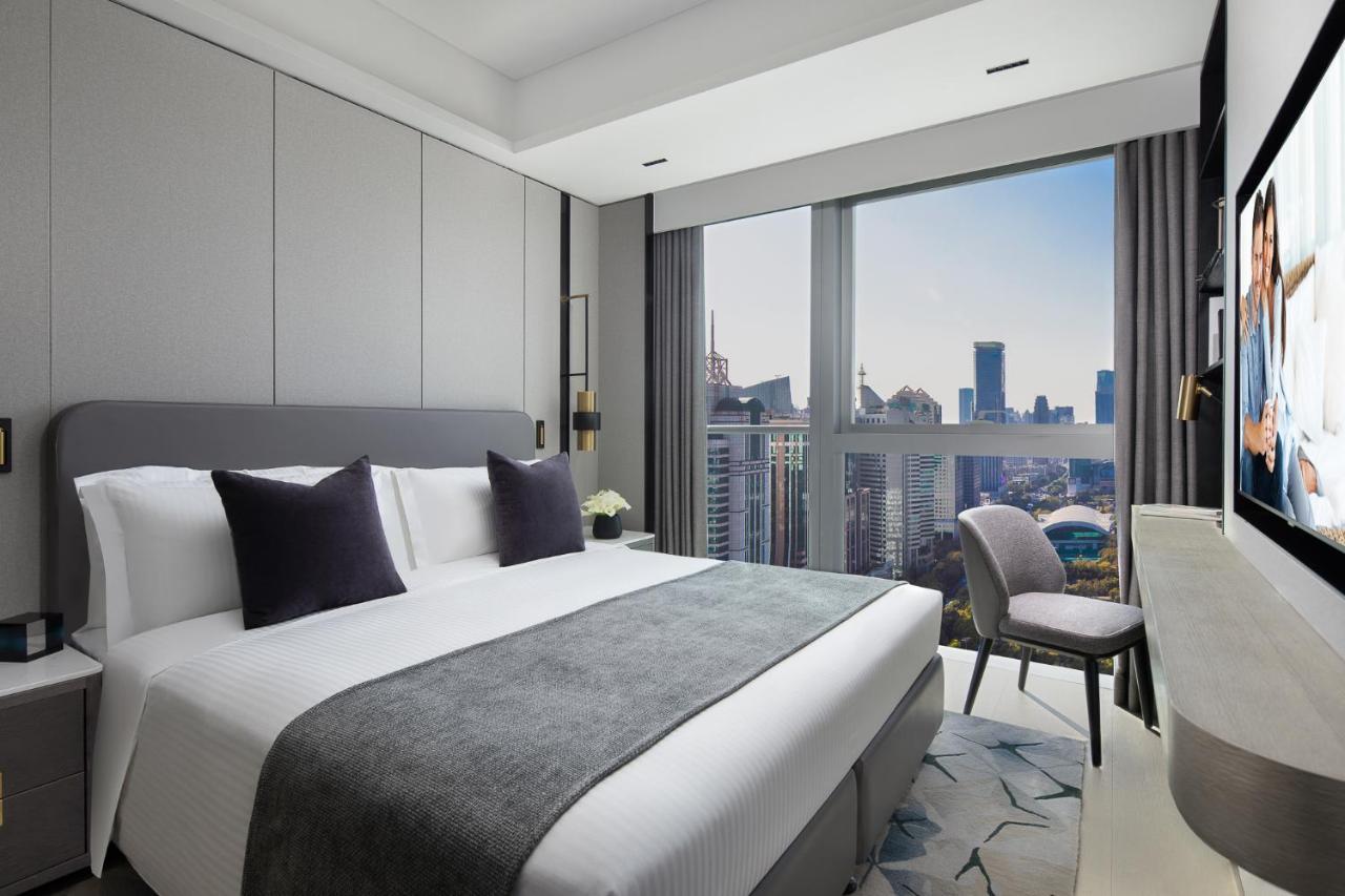 Apartamento Ascott Icc Cantón Exterior foto