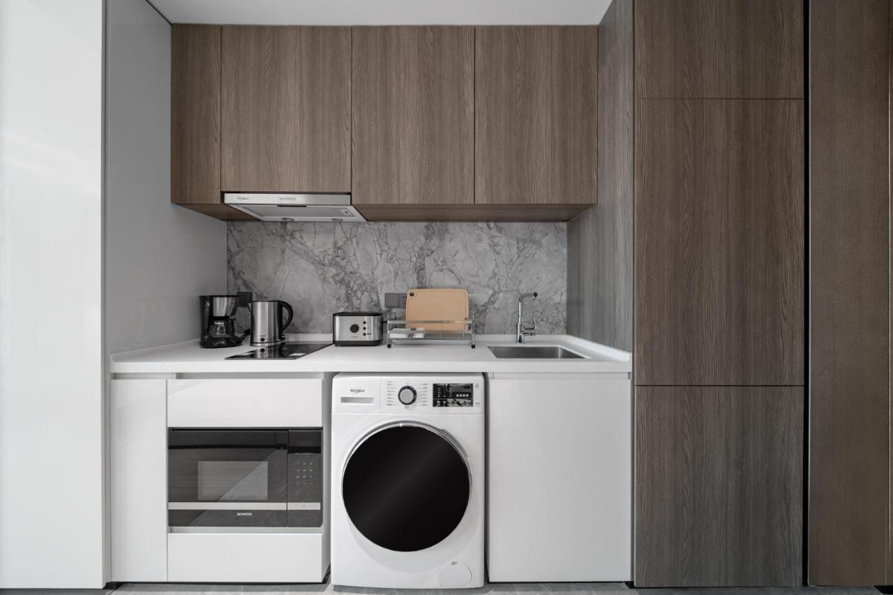 Apartamento Ascott Icc Cantón Exterior foto