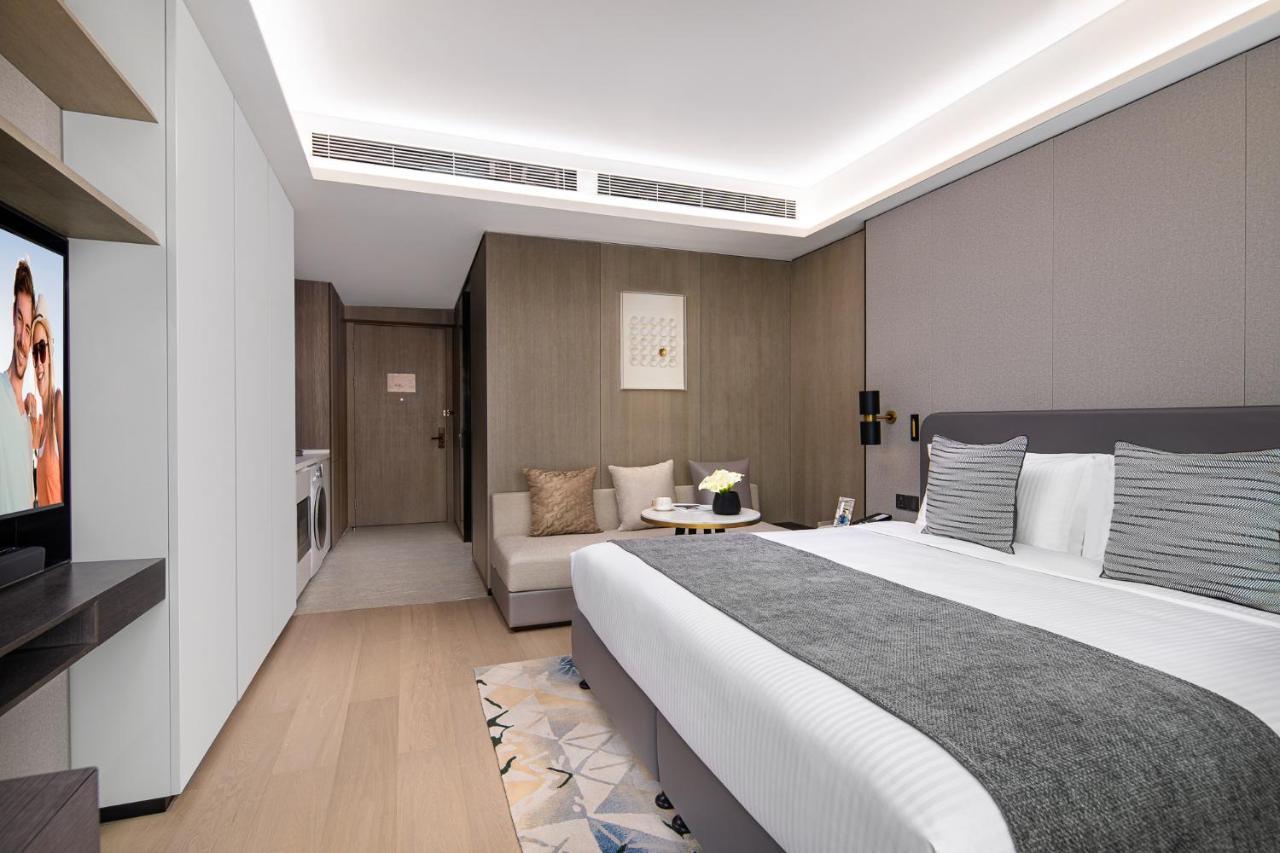 Apartamento Ascott Icc Cantón Exterior foto