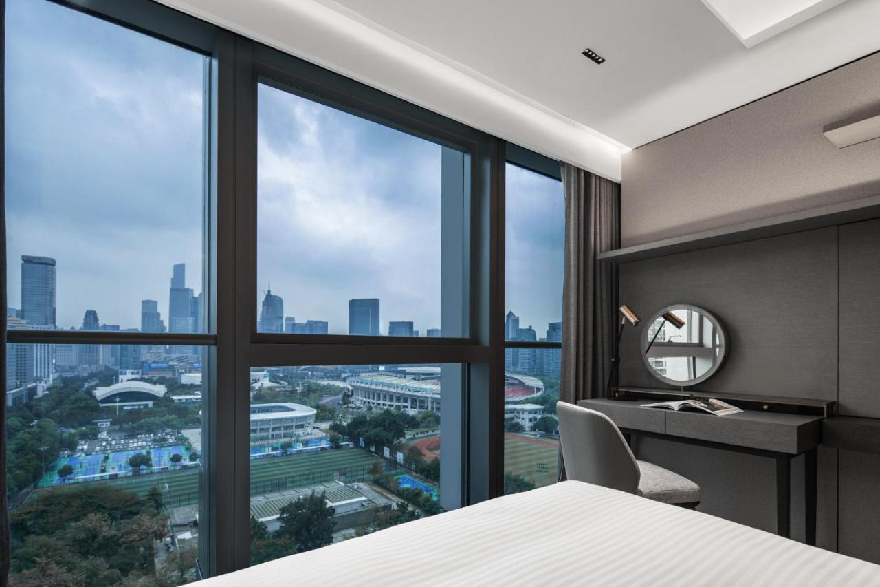 Apartamento Ascott Icc Cantón Exterior foto