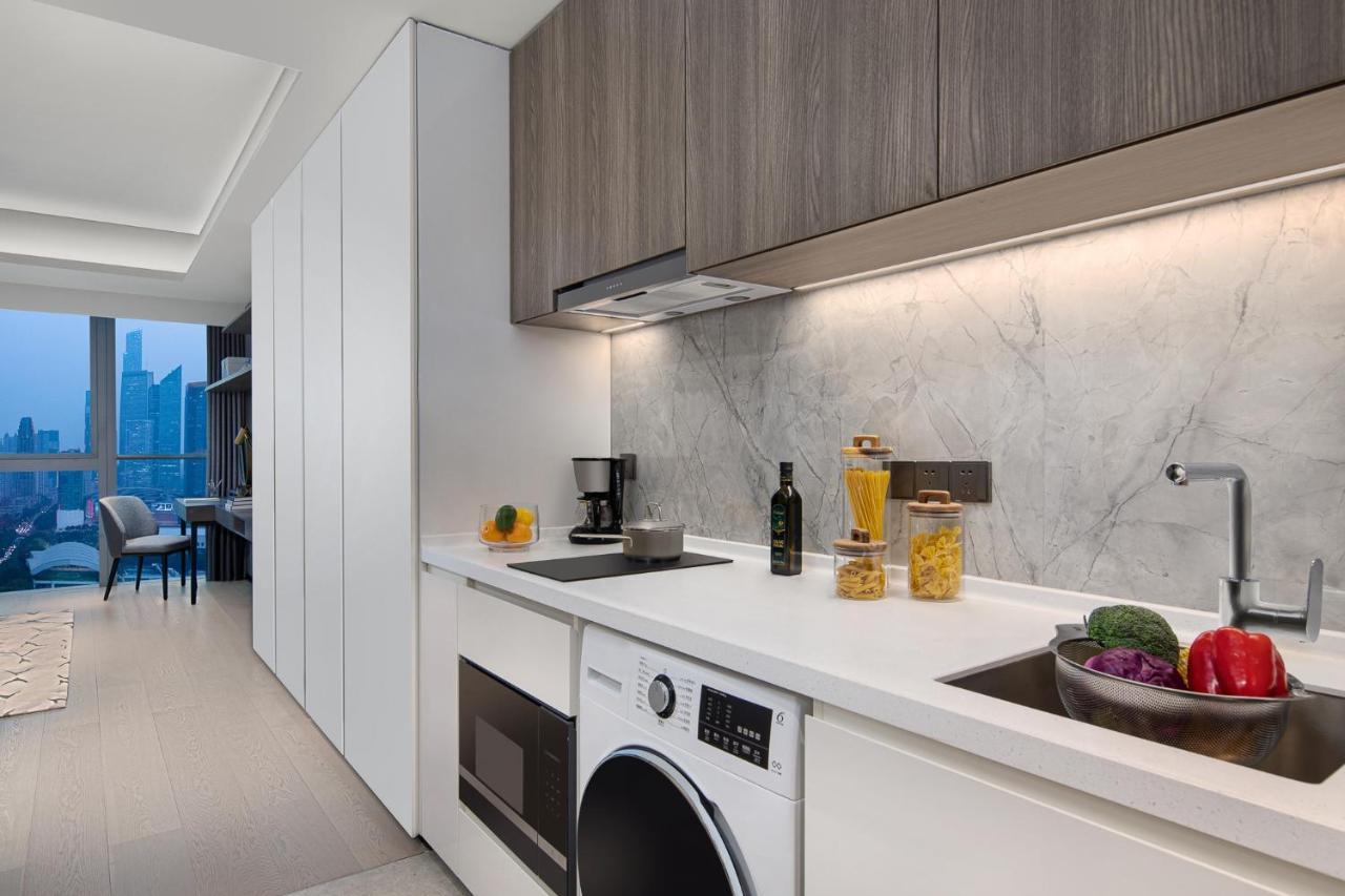 Apartamento Ascott Icc Cantón Exterior foto