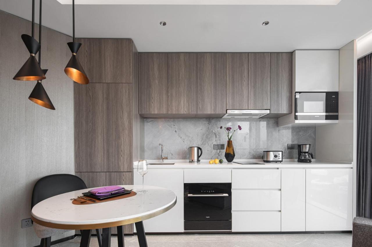 Apartamento Ascott Icc Cantón Exterior foto