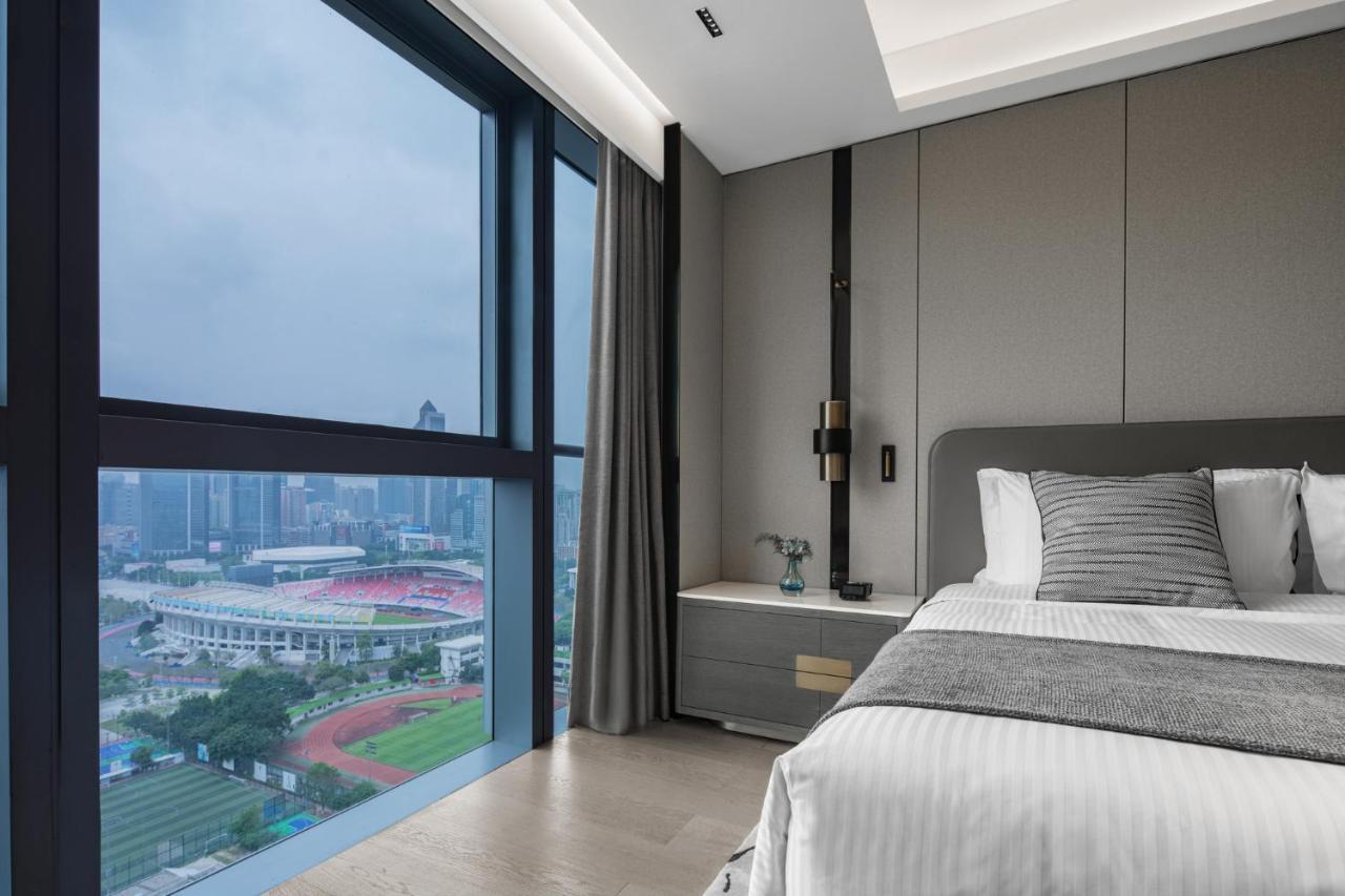 Apartamento Ascott Icc Cantón Exterior foto